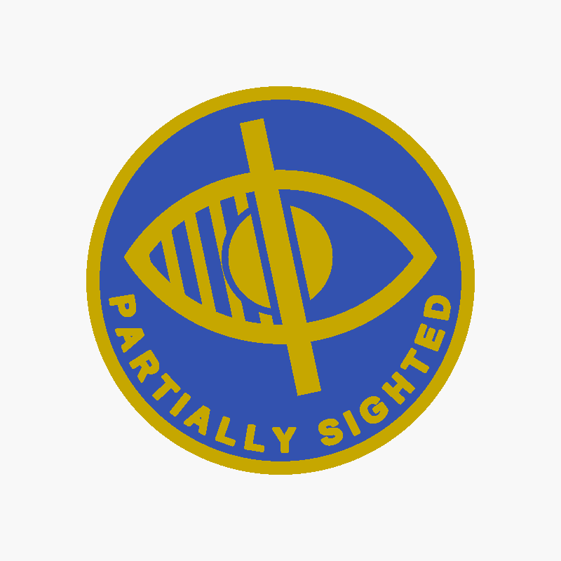 A round badge with a blue face and raised yellow detail. In the middle is the international symbol for visual disability, an almond-shaped eye with a solid iris, crossed by a thick diagonal slash, with hatching over the left side. The words PARTIALLY SIGHTED curve around the bottom rim.